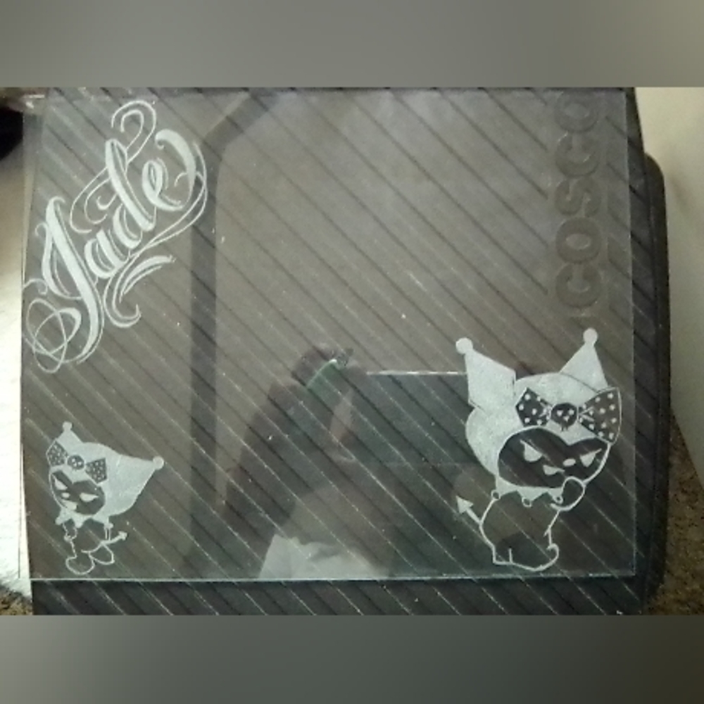 Custom hand made glass engraved frames.